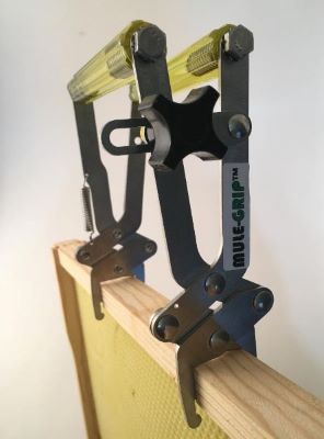 Universal Frame Holder with Locking-Arm